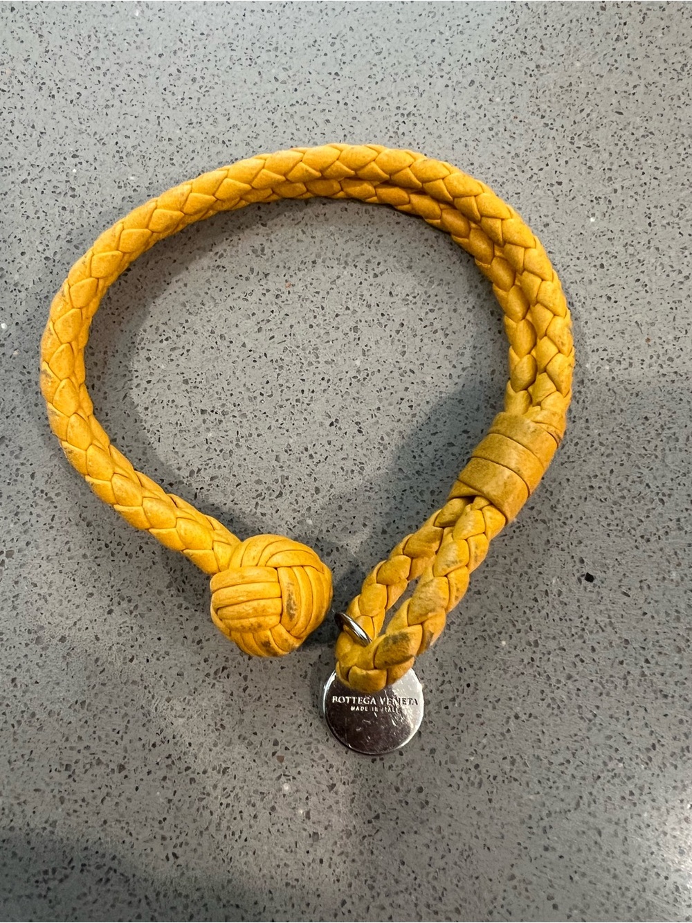 Bottega Veneta Mustard Braided Leather Knot Bracelet with Logo Disc
